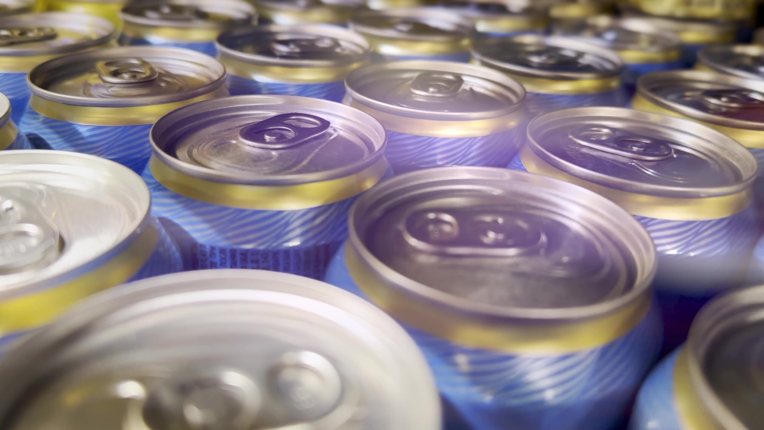 Many,Cans,Of,Beer,On,The,Shelf,In,The,Supermarket.